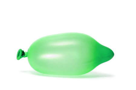 a green balloon isolated on a white backgroundの写真素材