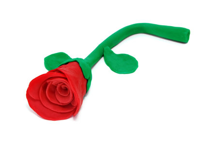 a plasticine red rose isolated on a white backgroundの写真素材