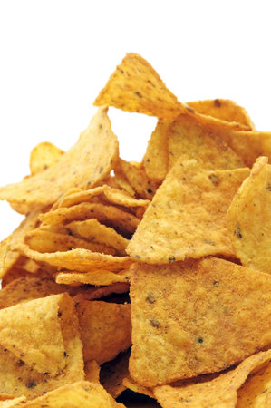 a pile of nachos isolated on a white background