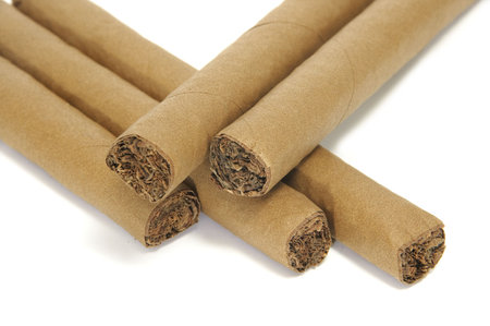closeup of some cigars isolated on a white background