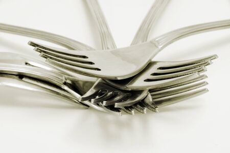 many forks isolated on a white bakcgroundの写真素材