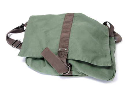 a green canvas purse isolated on a white backgroundの写真素材