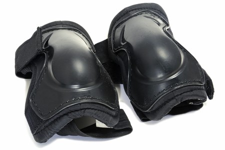 a pair of knee protectors isolated on a white backgroundの写真素材