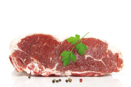 a slice of tenderloin isolated on a white backgroundの写真素材