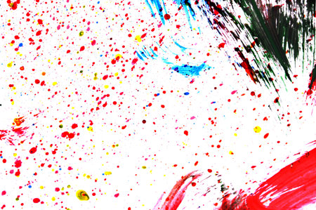 background of splashing and brushstrokes of different colors on a white background