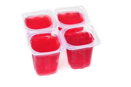 red gelatin glasses on a white background