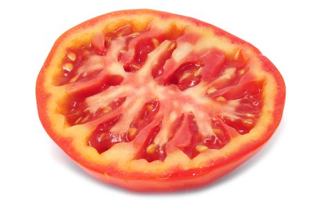 a red tomato cut in half isolated on a white backgroundの写真素材