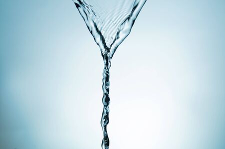 splash of crystalline water on a degrade backgroundの写真素材
