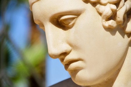 closeup of a face of a classic statueの写真素材