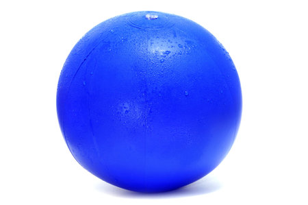 a blue beach ball isolated on a white backgroundの写真素材