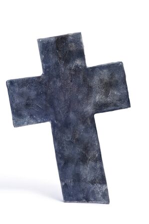 closeup of a stone cross for Halloween isolated on a white backgroundの写真素材