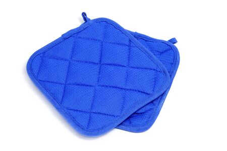 a pair of blue pot-holders isolated on a white backgroundの写真素材