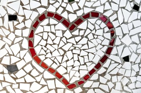 a red heart made with mosaic bitsの写真素材