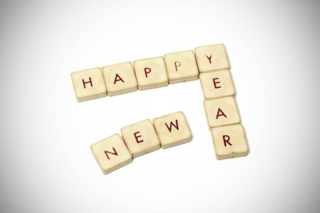 happy new year written with pieces of a word gameの写真素材