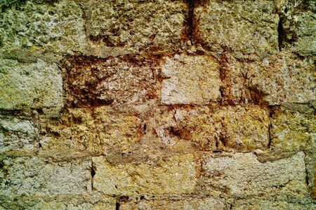 background made of a close-up of a stone wallの写真素材