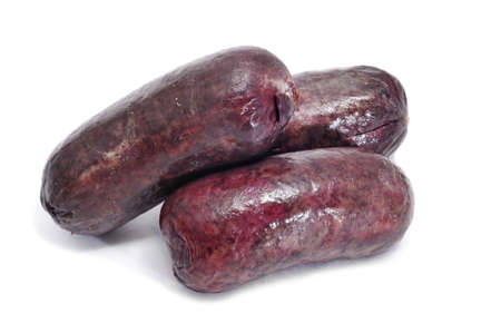 a pile of morcillas, typical Spanish sausage, on a white backgroundの写真素材