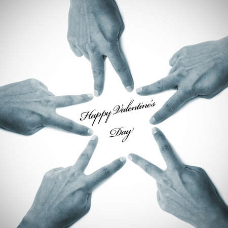 happy valentine's day written on a white background with hands drawing a star の写真素材