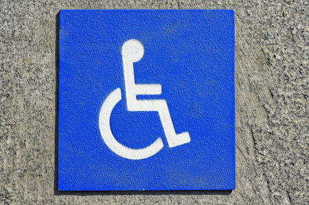 closeup of a disabled signal on white over blue