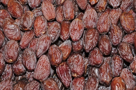 a pile of dried dates ready to sellの写真素材