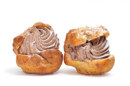 closeup of some profiteroles filled with chocolate