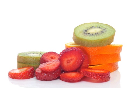 closeup of a pile of fruit slices on a white backgroundの写真素材