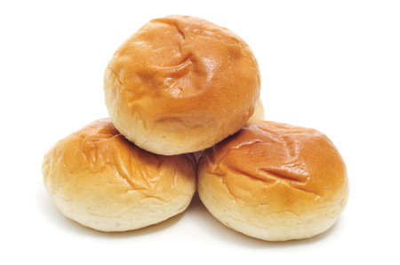 a pile of breakfast rolls on a white backgroundの写真素材