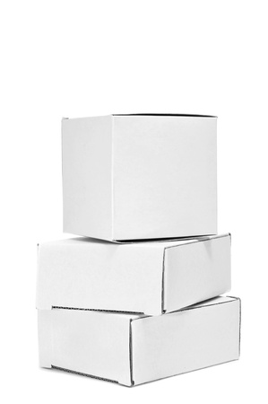 a pile of white cardboard boxes on a white backgroundの写真素材