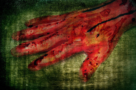 a scary bloody hand in a scary background for Halloweenの写真素材