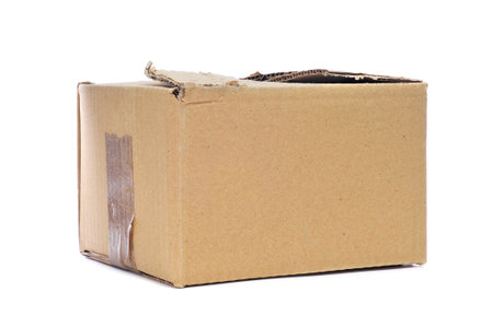a worn cardboard box on a white background