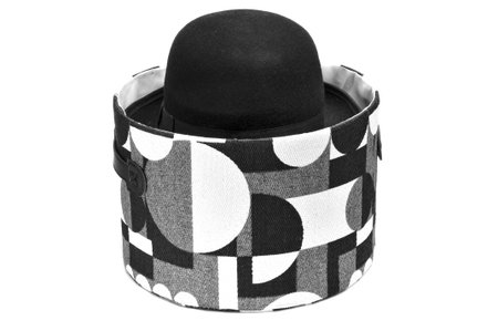 bowler had in a bandbox lined with a geometrical patterned fabric