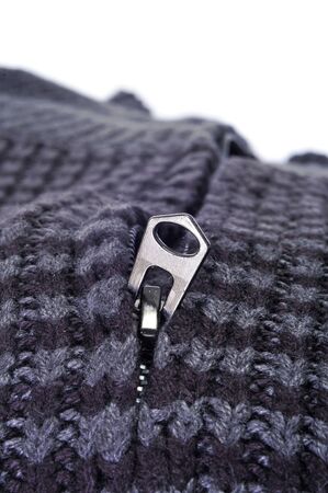 closeup of a gray patterned cardigan on a white backgroundの写真素材