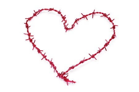 heart-shaped barbed wire on a white backgroundの写真素材