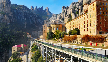 Monistrol de Montserrat, Spain - February 11, 2011: Abbey of Santa Maria de Montserrat in Monistrol de Montserrat, Spain. It hosts the Virgin of Montserrat, the favorite in Cataloniaのeditorial素材