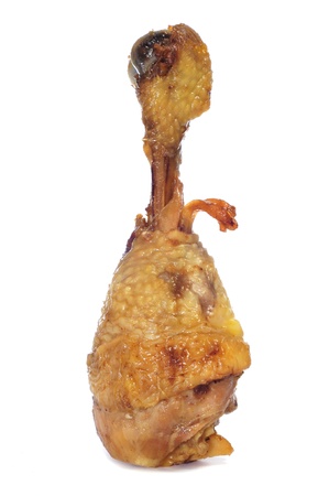 roasted chicken leg on a white backgroundの写真素材