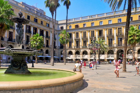 Barcelona, Spain - August 16, 2011: Plaza Real in Barcelona, Spain. The square, with lanterns designed by Gaudi and the Fountain of Three Graces in the center, has a lot of restaurantsのeditorial素材