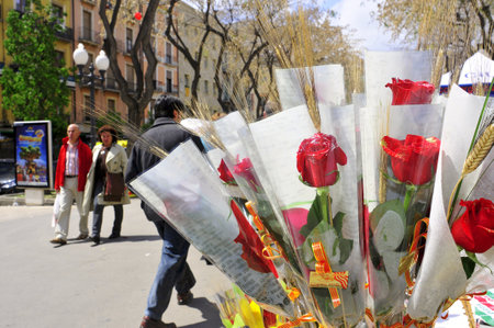 Tarragona, Spain - April 23, 2012: Saint George's Day in Tarragona, Spain. Every April 23th, red roses and books are sold in stalls in Rambla Nova, the most important street in the cityのeditorial素材