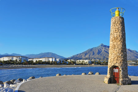 Marbella, Spain - March 13, 2012: Beacon in Puerto Banus in Marbella, Spain. Puerto Banus is visited annually by nearly 5 million people and its marina has berths for 915 boatsのeditorial素材