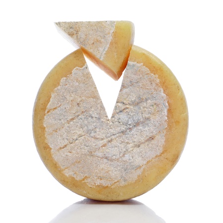 piece of cheese on a white backgroundの写真素材