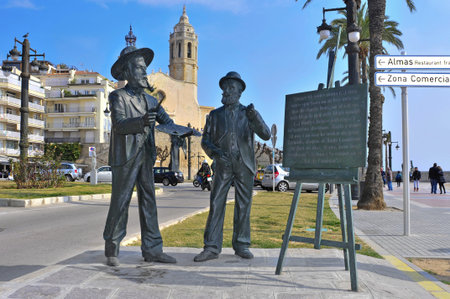 Sitges, Spain - March 3, 2012: Monument to Santiago Rusinol and Ramon Casas in Sitges, Spain. This statue pays tribute to both international catalan modernist artists established in Sitgesのeditorial素材