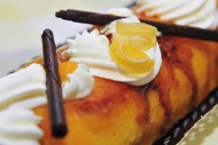 brazo de gitano, typical spanish swiss roll filled with pastry cream