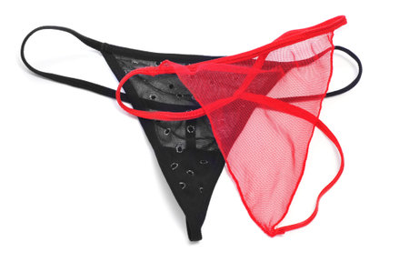 a couple of sexy T-back thongs, one black and one red, on a white background