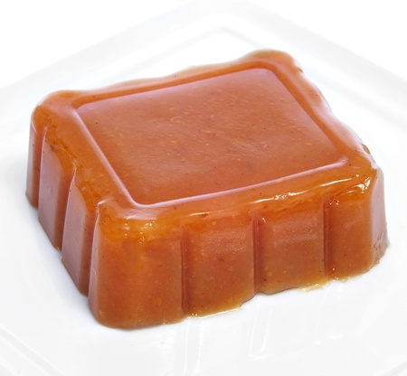 a plate with a piece of dulce de membrillo, quince jelly, typical of Spainの写真素材