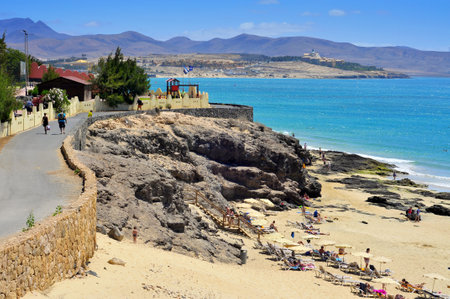 Fuerteventura, Spain - June 22, 2012: Esmeralda Beach in Fuerteventura, Canary Islands, Spain. This white sand beach with turquoise water is named after the nearby hotel Playa Esmeraldaのeditorial素材