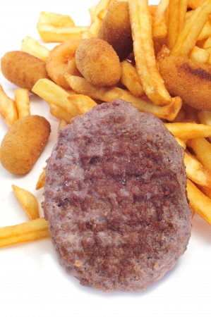 a pile of fried and fattening food on a white backgroundの写真素材