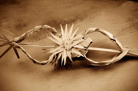 a spanish decorated palm typical on Palm Sunday on a canvas backgroundの写真素材