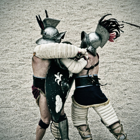Tarragona, Spain - May 26, 2012: Gladiators on the arena of Roman Amphitheater in Tarragona, Spain. Every year, the historic recreation program TarracoViva recreates a gladiators fightのeditorial素材