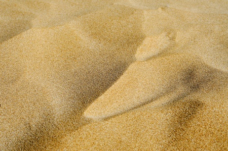closeup of a pile of sand of a beach or a desertの写真素材