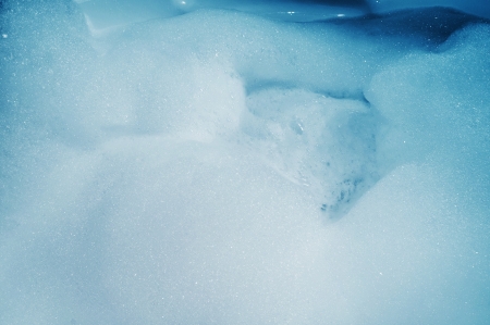 closeup of a whirlpool bath full of foamの写真素材