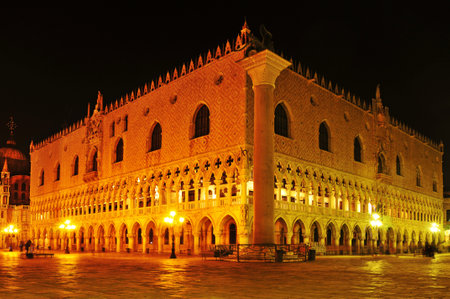 view of the Palazzo Ducale, Doges Palace, in Venice, Italy, at nightのeditorial素材