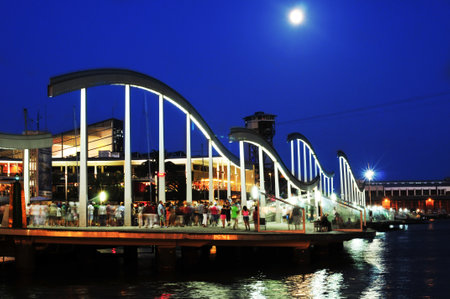 Barcelona, Spain - August 20, 2013  Rambla de Mar and Maremagnum at night in Barcelona, Spain  Maremagnum is a leisure center with shops, restaurants, an IMAX cinema and an aquariumのeditorial素材